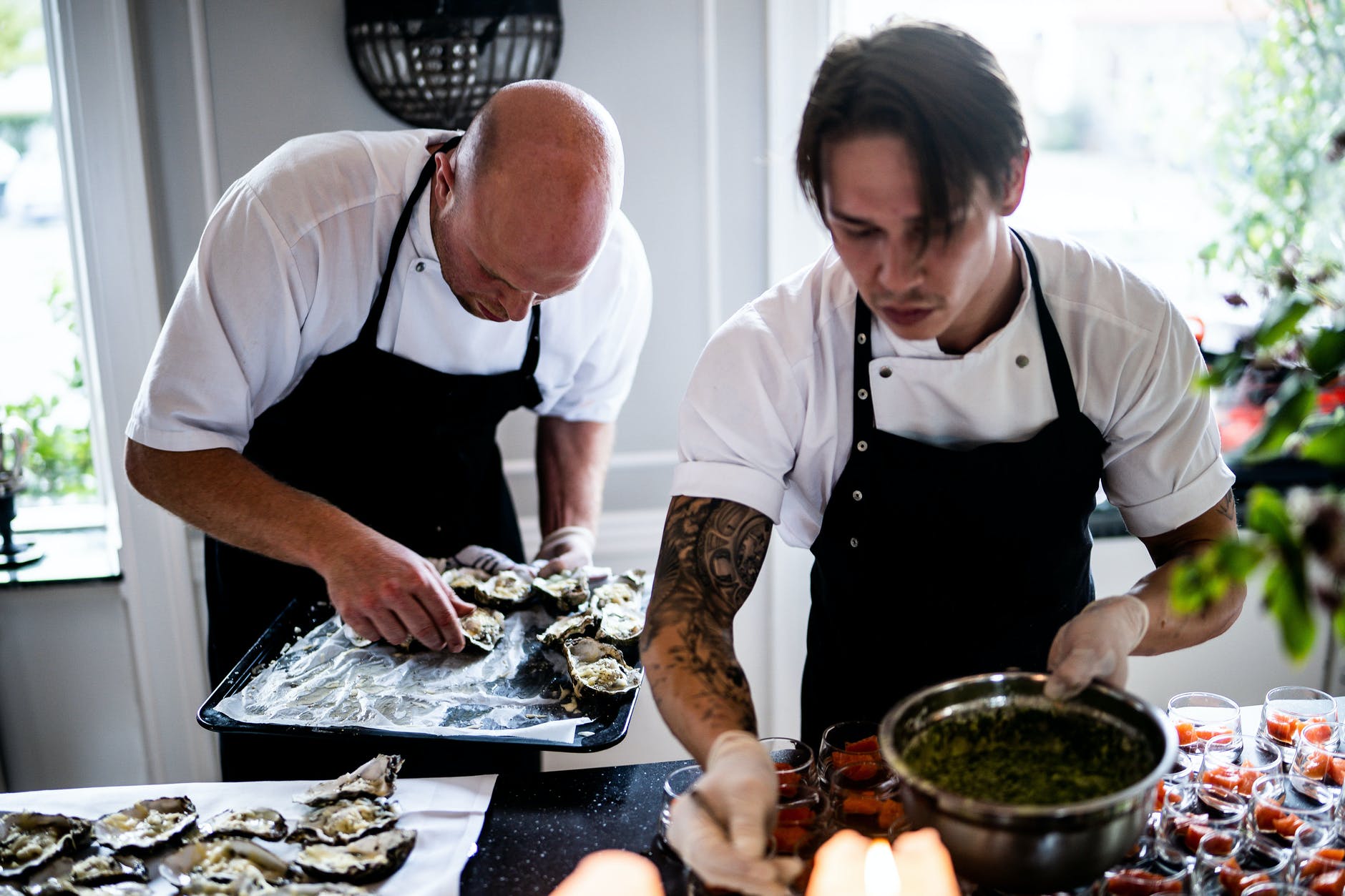 two men preparing food