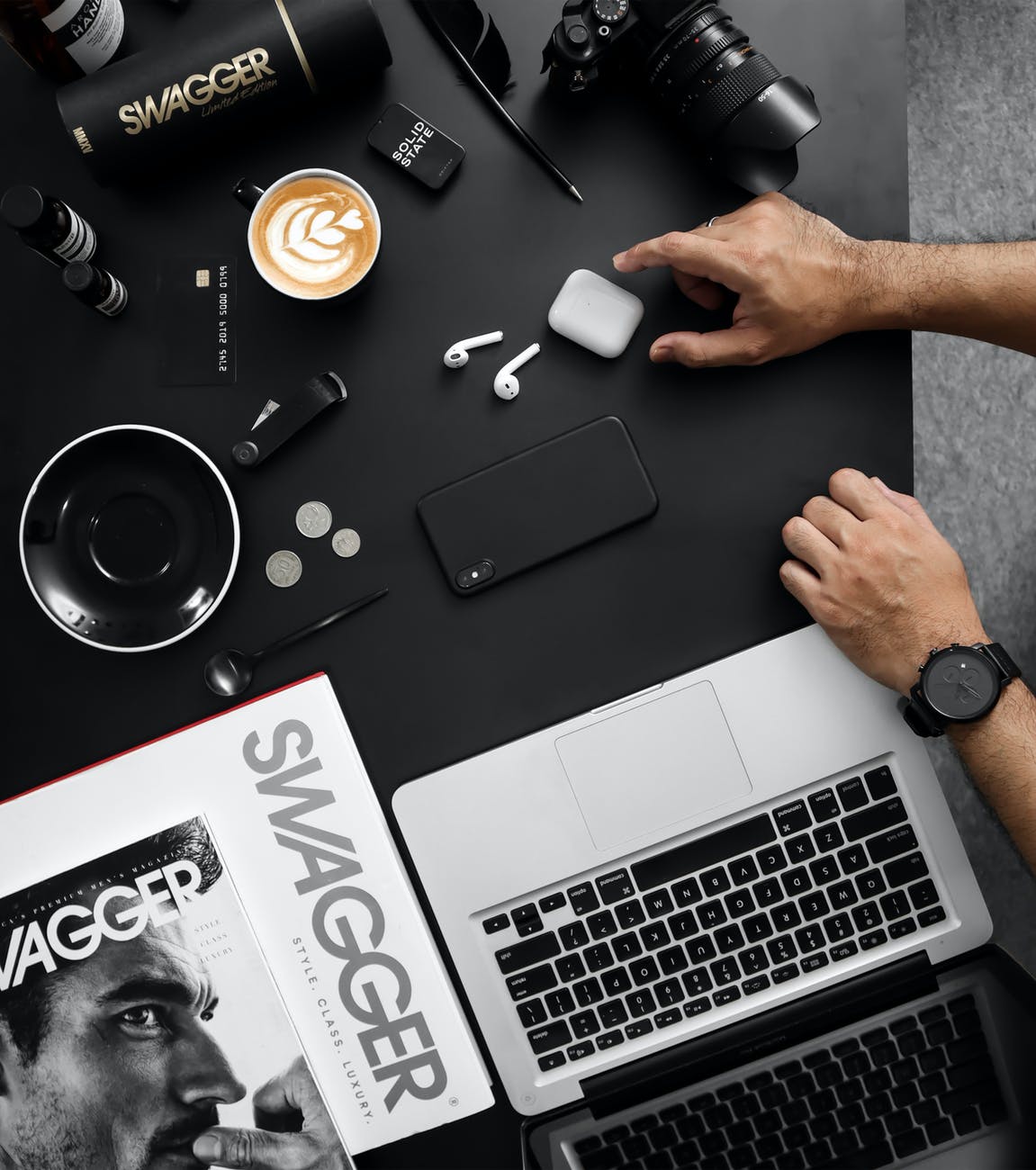 top view of assorted gadgets on desk